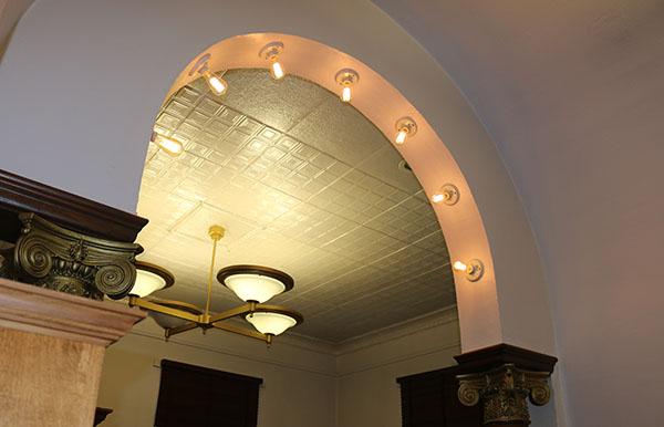 Harriman Public Library lighted arch and gold  pillar capitals